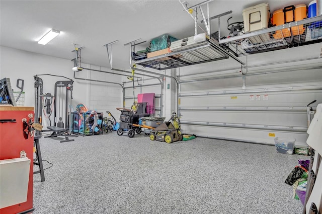 4477 Renly Ln, Clermont, FL 34711 - garage featuring a garage door opener
