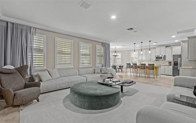 12023 Gold Creek Trl, Windermere, FL 34786 - living room with crown molding, a chandelier, and recessed lighting