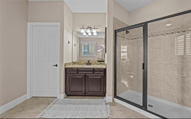 12023 Gold Creek Trl, Windermere, FL 34786 - bathroom with a stall shower, vanity, and tile patterned floors