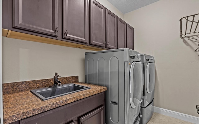 12023 Gold Creek Trl, Windermere, FL 34786 - washroom featuring separate washer and dryer and cabinet space