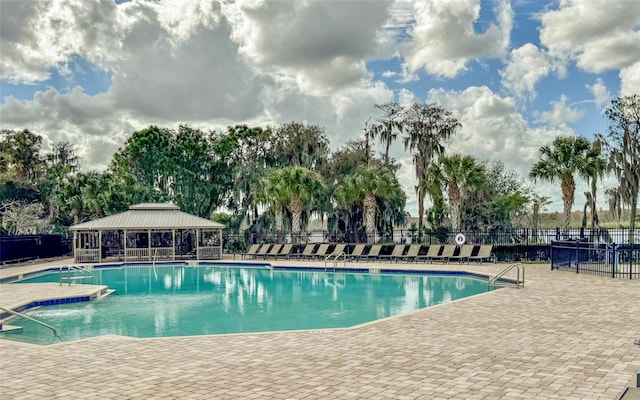 12023 Gold Creek Trl, Windermere, FL 34786 - community pool with a patio and a gazebo