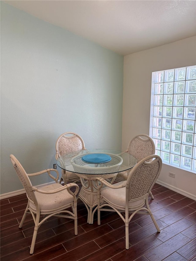 26735 Little John Ct Unit 27, Bonita Springs, FL 34135 - dining area with dark wood-type flooring