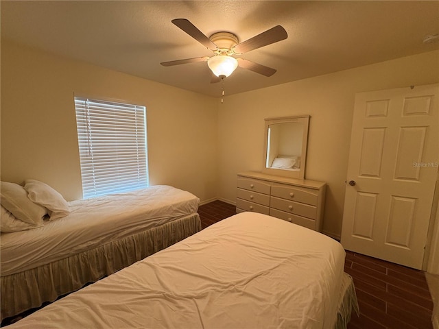 26735 Little John Ct Unit 27, Bonita Springs, FL 34135 - bedroom featuring dark wood-type flooring and a ceiling fan