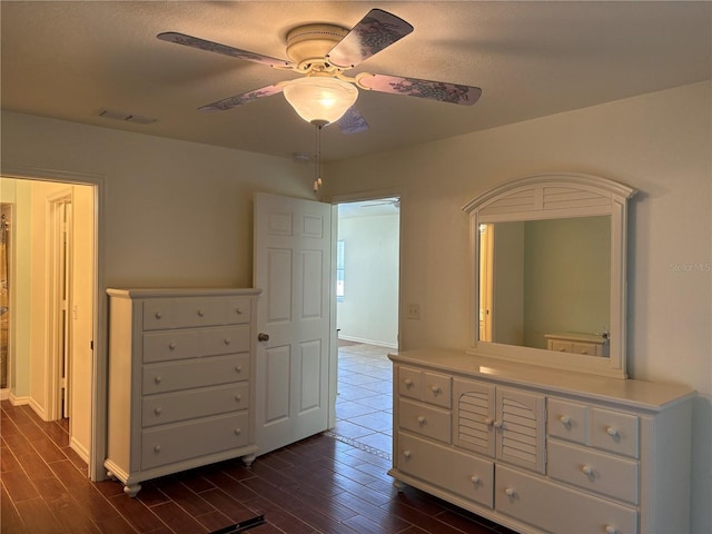 26735 Little John Ct Unit 27, Bonita Springs, FL 34135 - bedroom featuring dark wood-style flooring and a ceiling fan