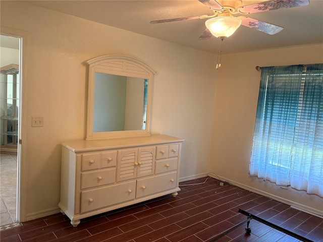26735 Little John Ct Unit 27, Bonita Springs, FL 34135 - bedroom with wood tiled floors and ceiling fan