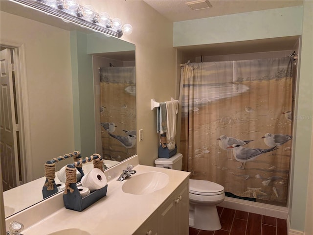 26735 Little John Ct Unit 27, Bonita Springs, FL 34135 - full bath with double vanity, wood finished floors, and curtained shower
