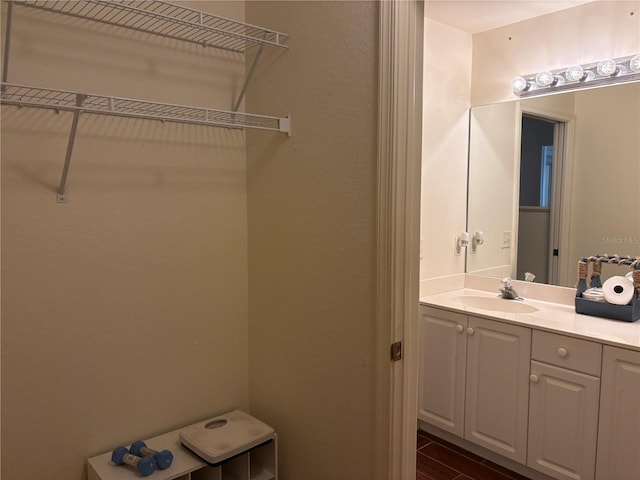 26735 Little John Ct Unit 27, Bonita Springs, FL 34135 - bathroom with vanity and wood finished floors