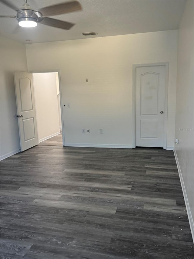 1954 Marabou Dr, Davenport, FL 33896 - unfurnished room featuring dark wood finished floors and a ceiling fan