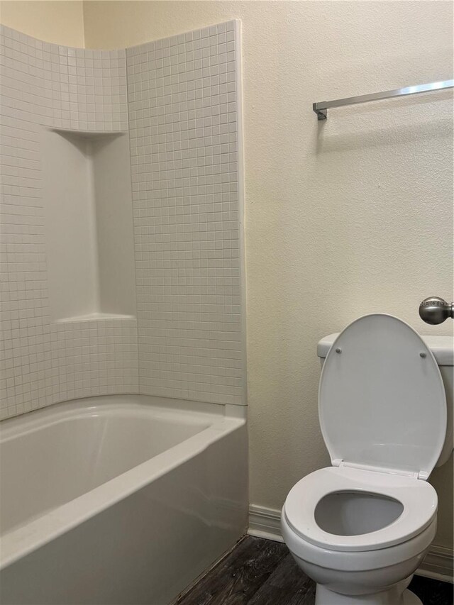 1954 Marabou Dr, Davenport, FL 33896 - bathroom with shower / tub combination and wood finished floors