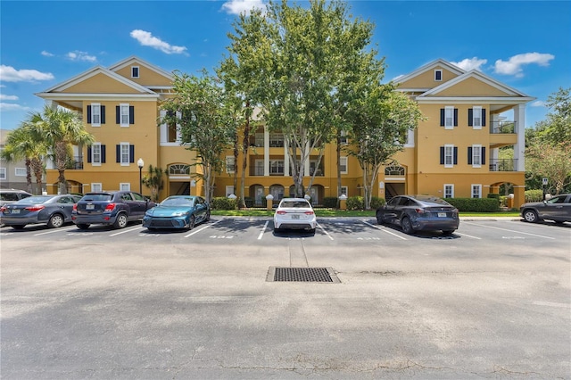 3593 Conroy Rd Unit 416, Orlando, FL 32839 - view of property with uncovered parking