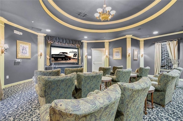 3593 Conroy Rd Unit 416, Orlando, FL 32839 - carpeted cinema with crown molding, decorative columns, a chandelier, recessed lighting, and a raised ceiling