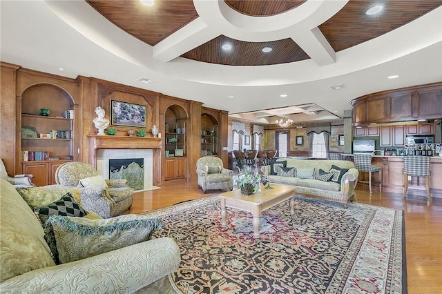 3593 Conroy Rd Unit 416, Orlando, FL 32839 - living room featuring coffered ceiling, recessed lighting, light wood-type flooring, beamed ceiling, and a fireplace with flush hearth