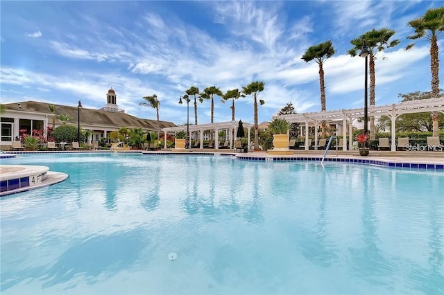 3593 Conroy Rd Unit 416, Orlando, FL 32839 - community pool featuring a pergola