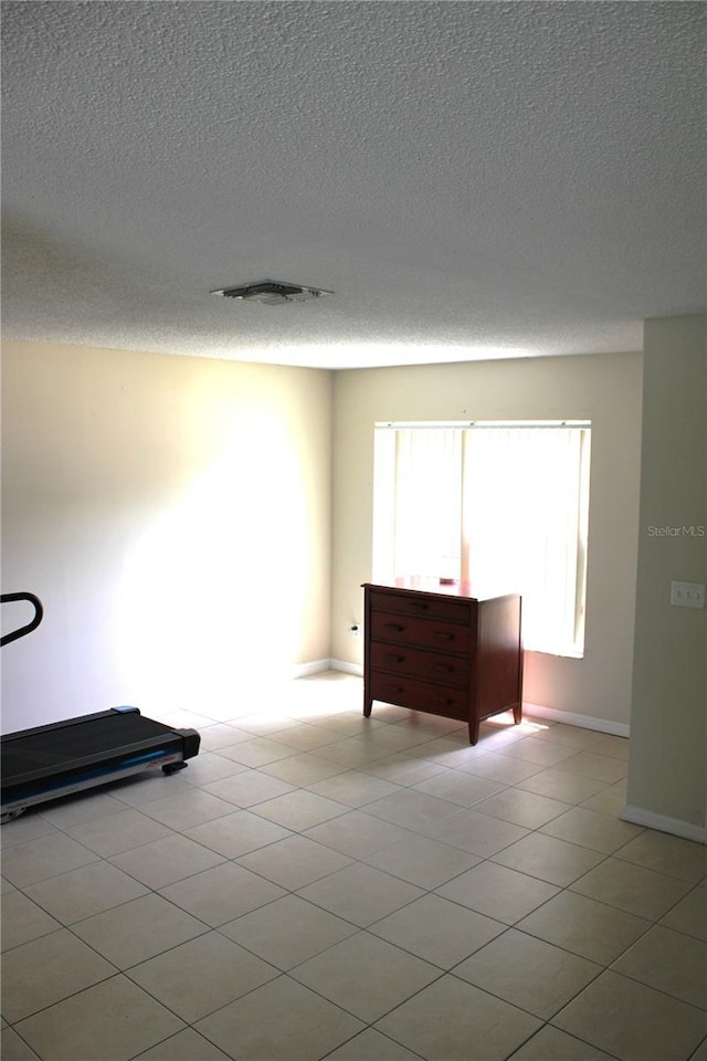 1533 Blue Sky Way, Clermont, FL 34714 - unfurnished room featuring a textured ceiling and baseboards