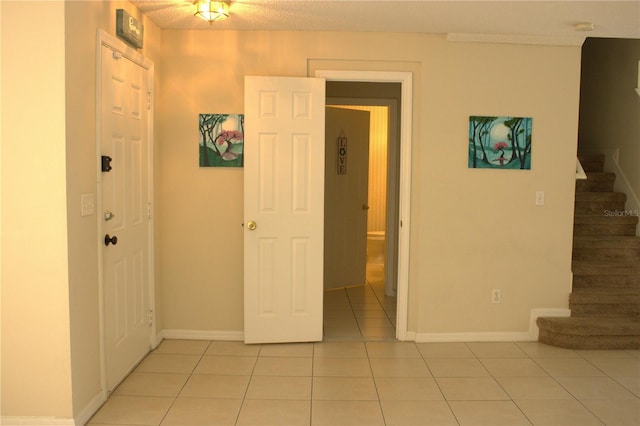 1533 Blue Sky Way, Clermont, FL 34714 - empty room featuring stairway and light tile patterned floors
