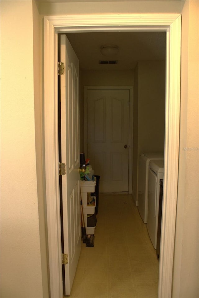 1533 Blue Sky Way, Clermont, FL 34714 - corridor with washing machine and clothes dryer
