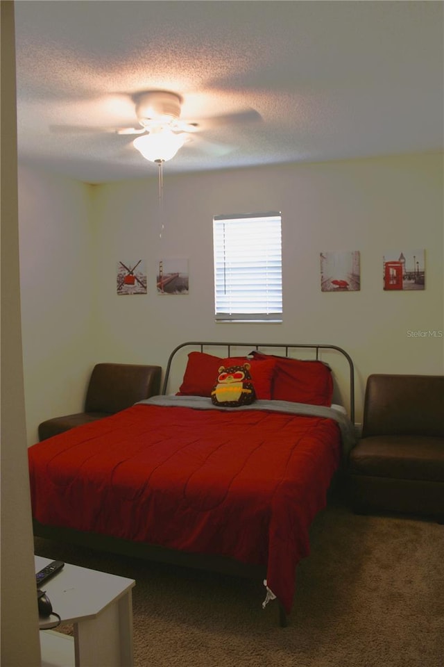 1533 Blue Sky Way, Clermont, FL 34714 - carpeted bedroom featuring ceiling fan and a textured ceiling