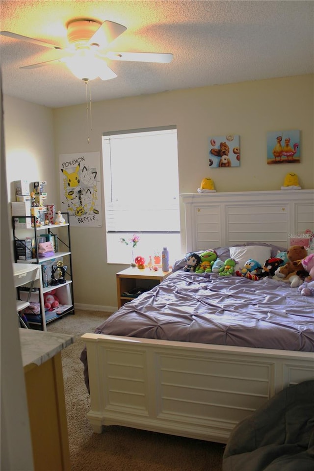1533 Blue Sky Way, Clermont, FL 34714 - bedroom with carpet flooring, ceiling fan, and a textured ceiling