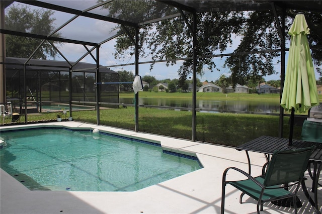 1533 Blue Sky Way, Clermont, FL 34714 - swimming pool with a patio area, a water view, glass enclosure, and a lawn
