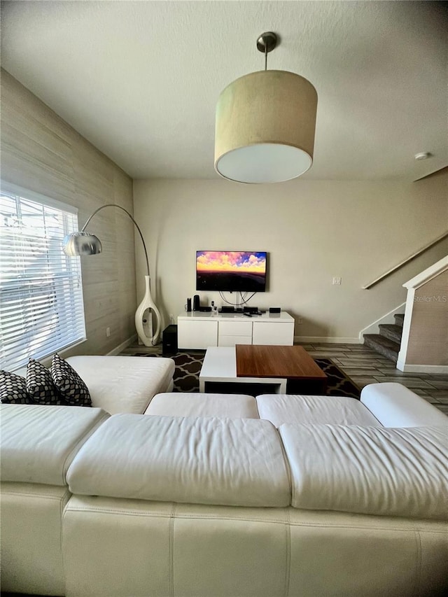 3191 Pequod Pl, Kissimmee, FL 34746 - living area featuring stairway and baseboards