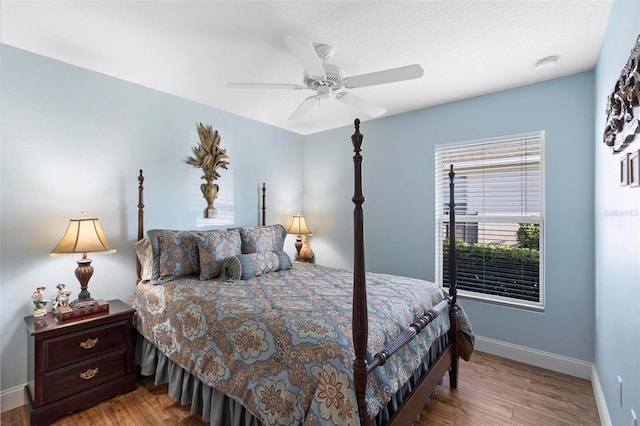 43 Pergola Pl, Ormond Beach, FL 32174 - bedroom featuring wood finished floors and a ceiling fan