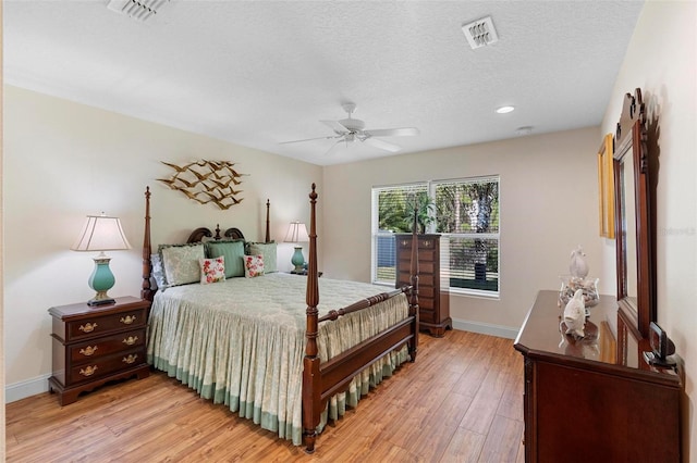 43 Pergola Pl, Ormond Beach, FL 32174 - bedroom featuring light wood-style flooring, a textured ceiling, ceiling fan, and recessed lighting