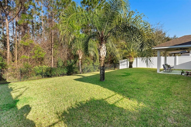 43 Pergola Pl, Ormond Beach, FL 32174 - fenced backyard with a patio area