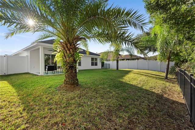 43 Pergola Pl, Ormond Beach, FL 32174 - fenced backyard featuring a patio area