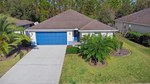 43 Pergola Pl, Ormond Beach, FL 32174 - single story home with concrete driveway, stucco siding, a front lawn, and a garage