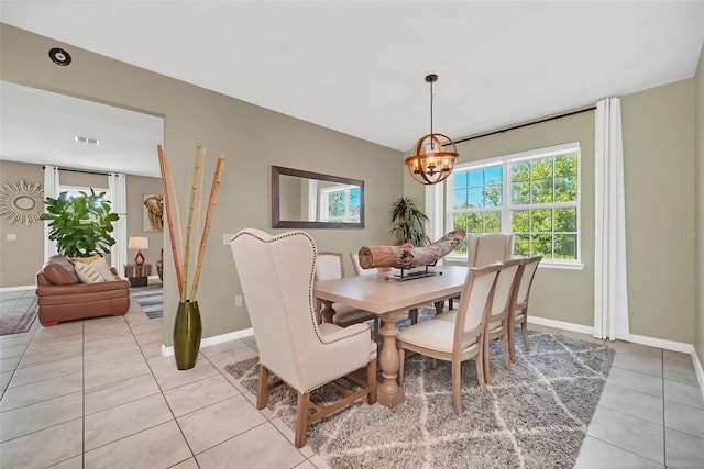6926 Cucamelon Ct, Windermere, FL 34786 - dining room with light tile patterned flooring and a chandelier