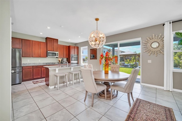 6926 Cucamelon Ct, Windermere, FL 34786 - dining room with a chandelier, light tile patterned floors, and recessed lighting