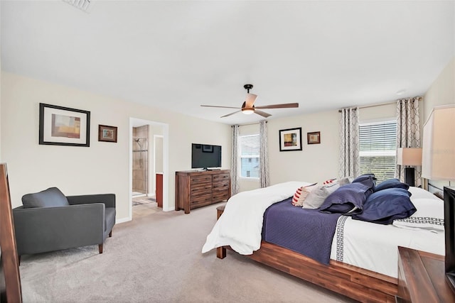 6926 Cucamelon Ct, Windermere, FL 34786 - bedroom with light colored carpet, a ceiling fan, and ensuite bath