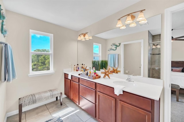 6926 Cucamelon Ct, Windermere, FL 34786 - bathroom featuring double vanity, a shower with shower door, tile patterned flooring, and a chandelier