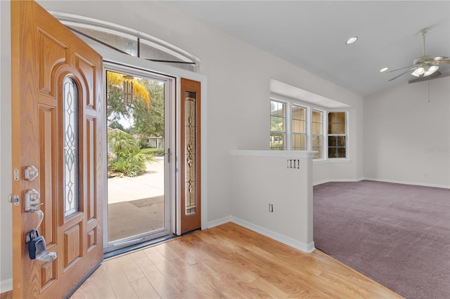 10642 Masters Dr, Clermont, FL 34711 - foyer featuring ceiling fan, light wood-style flooring, recessed lighting, and lofted ceiling