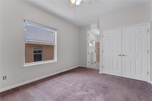 10642 Masters Dr, Clermont, FL 34711 - unfurnished bedroom featuring carpet, a closet, and ceiling fan