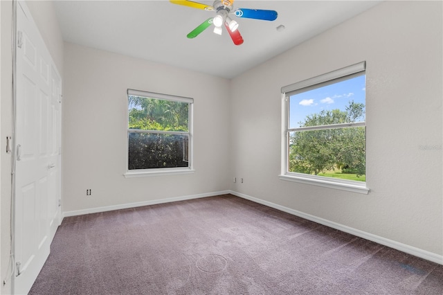 10642 Masters Dr, Clermont, FL 34711 - unfurnished bedroom featuring carpet flooring and ceiling fan