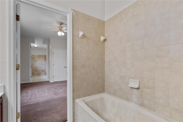 10642 Masters Dr, Clermont, FL 34711 - bathroom with a ceiling fan and vanity