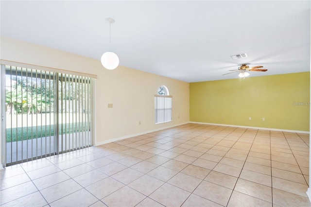 2670 S Palmetto Ridge Cir, Apopka, FL 32712 - spare room featuring plenty of natural light, light tile patterned floors, and a ceiling fan