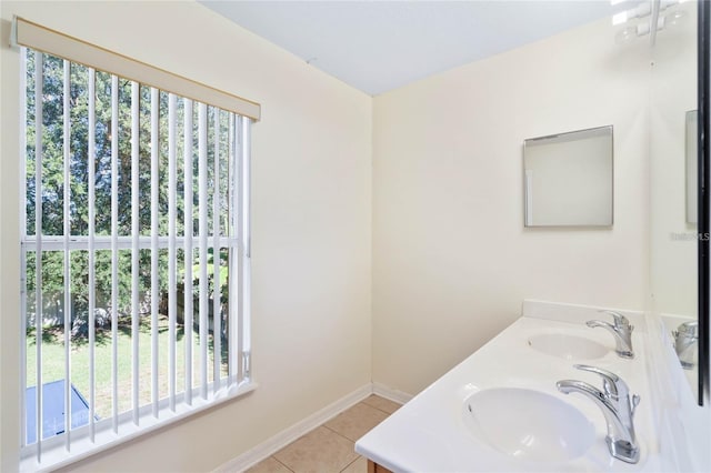 2670 S Palmetto Ridge Cir, Apopka, FL 32712 - bathroom with double vanity and tile patterned floors