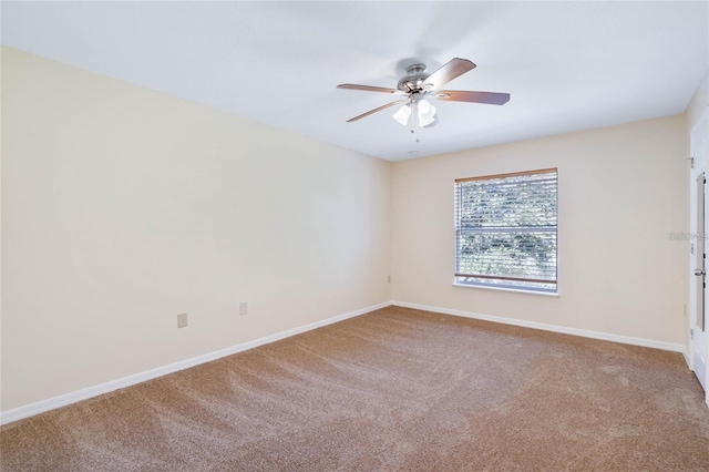 2670 S Palmetto Ridge Cir, Apopka, FL 32712 - carpeted spare room with baseboards and ceiling fan