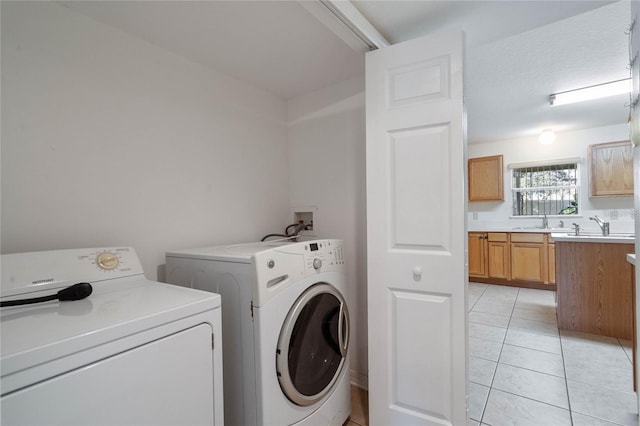 2670 S Palmetto Ridge Cir, Apopka, FL 32712 - washroom featuring washer and clothes dryer and light tile patterned floors