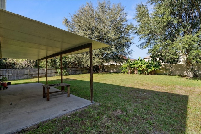 2670 S Palmetto Ridge Cir, Apopka, FL 32712 - fenced backyard featuring a patio
