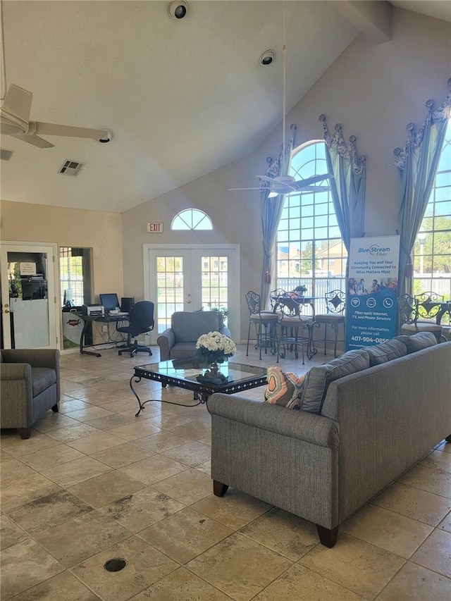 4400 Thornbriar Ln Unit A103, Orlando, FL 32822 - living room with french doors, high vaulted ceiling, stone tile floors, and ceiling fan