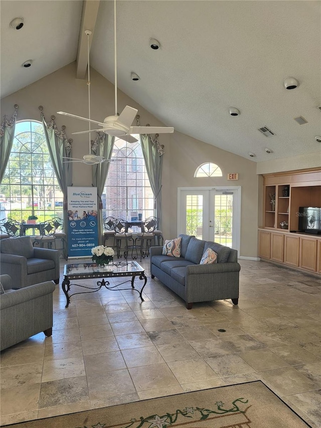 4400 Thornbriar Ln Unit A103, Orlando, FL 32822 - living room with healthy amount of natural light, beamed ceiling, and high vaulted ceiling