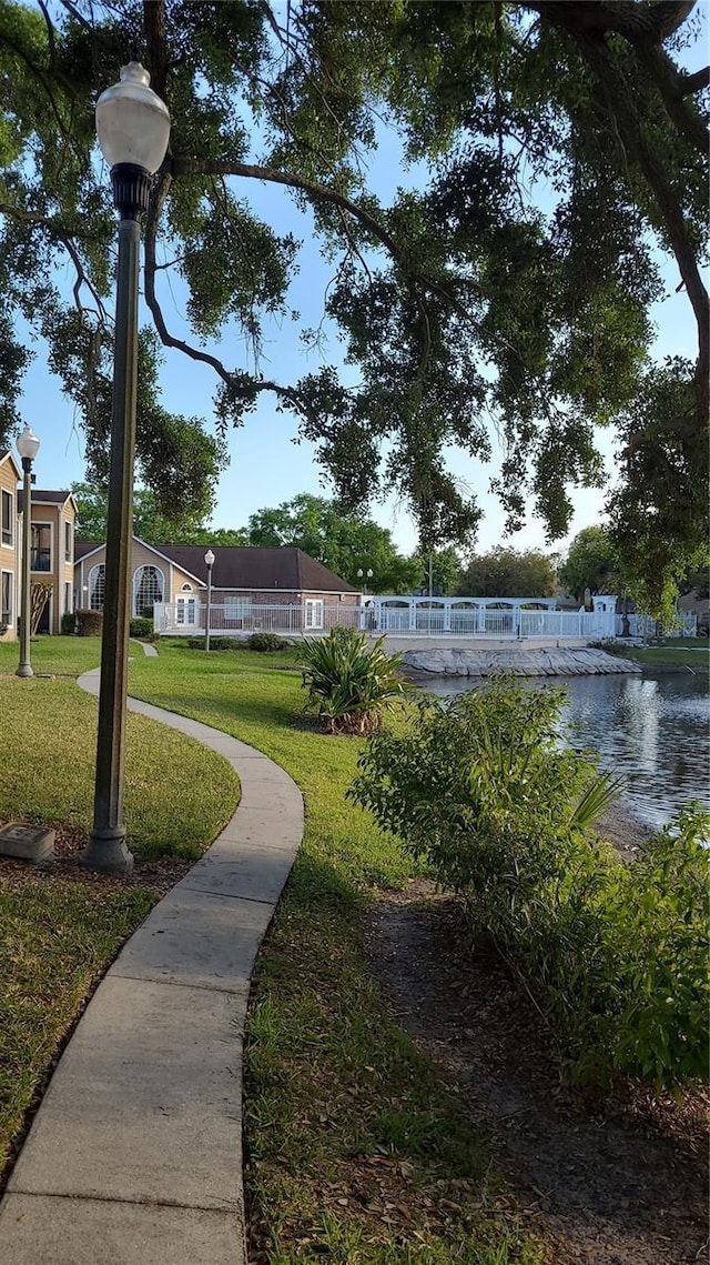 4400 Thornbriar Ln Unit A103, Orlando, FL 32822 - view of property's community with a yard and a water view