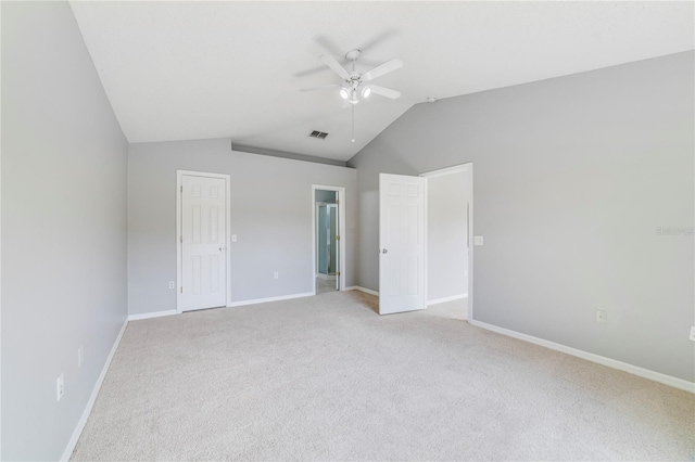 938 Gateshead Ct, Kissimmee, FL 34758 - unfurnished bedroom featuring light colored carpet, vaulted ceiling, and a ceiling fan