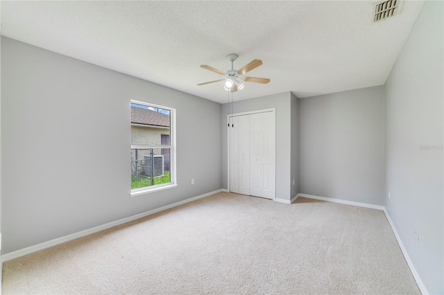 938 Gateshead Ct, Kissimmee, FL 34758 - unfurnished bedroom featuring carpet flooring, a closet, and ceiling fan