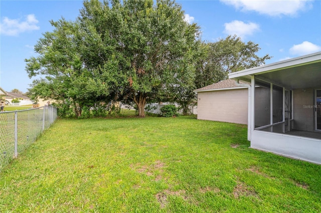938 Gateshead Ct, Kissimmee, FL 34758 - fenced backyard featuring a sunroom