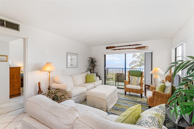 4570 Ocean Beach Blvd Unit 226, Cocoa Beach, FL 32931 - living room featuring tile patterned floors