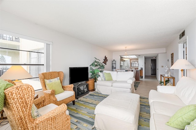 4570 Ocean Beach Blvd Unit 226, Cocoa Beach, FL 32931 - living room with light tile patterned flooring